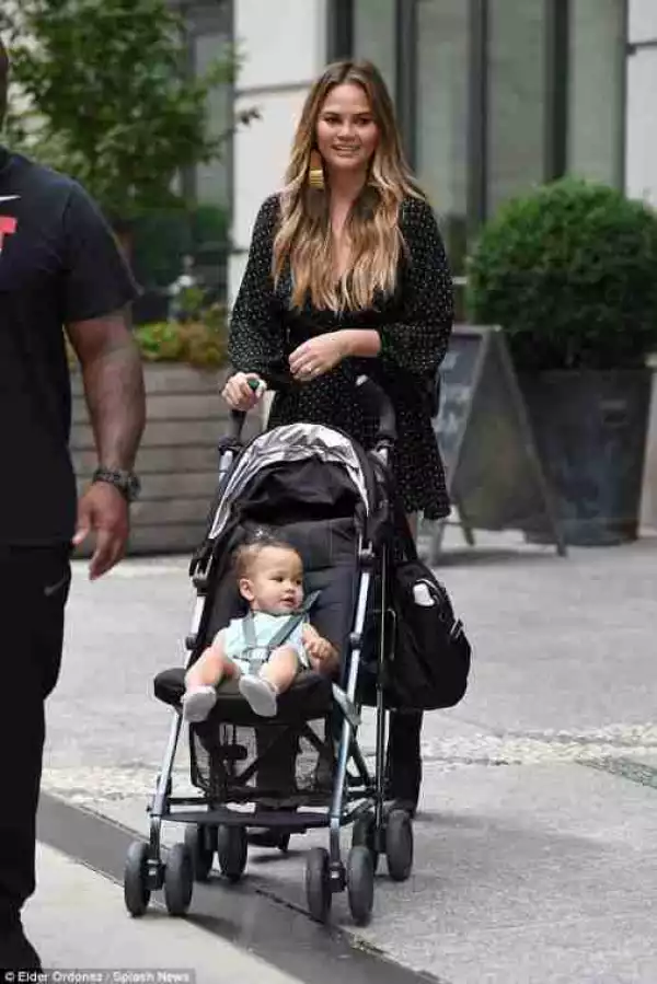 Sexy Mum Chrissy Teigen Takes A Walk With Her Cute Baby, Luna On The Streets Of NYC